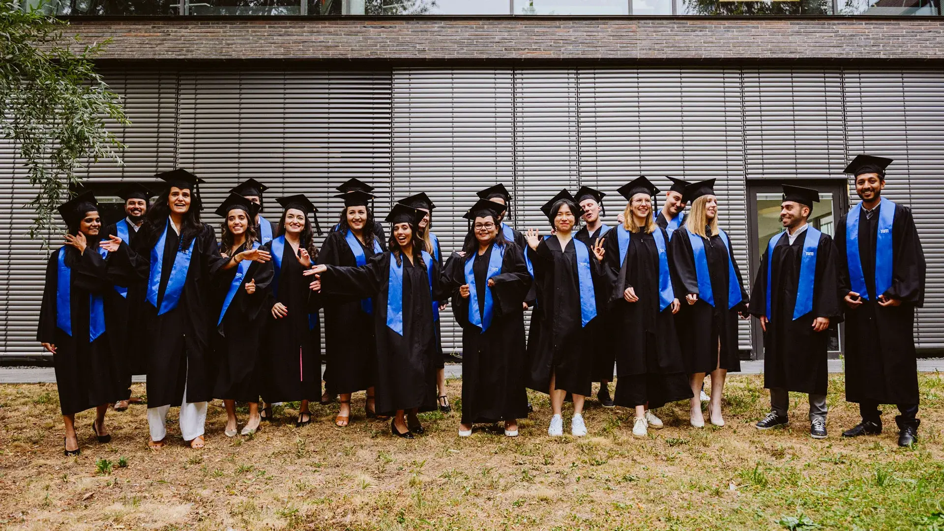 Batch graduates with their gowns