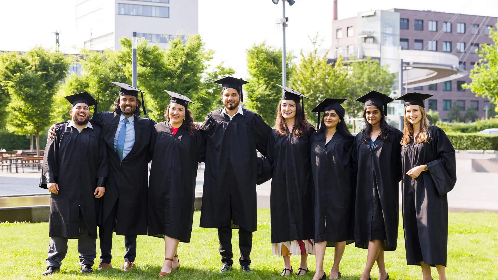 TUM graduates in gowns