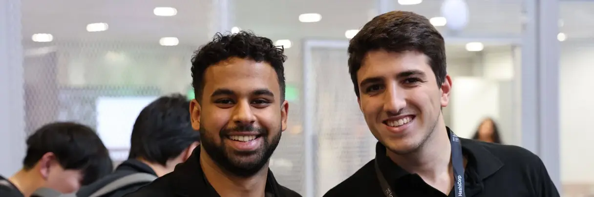 Ahmed Eltayyeb and Zahi Tougan at AWS re:Invent trade fair in Las Vegas