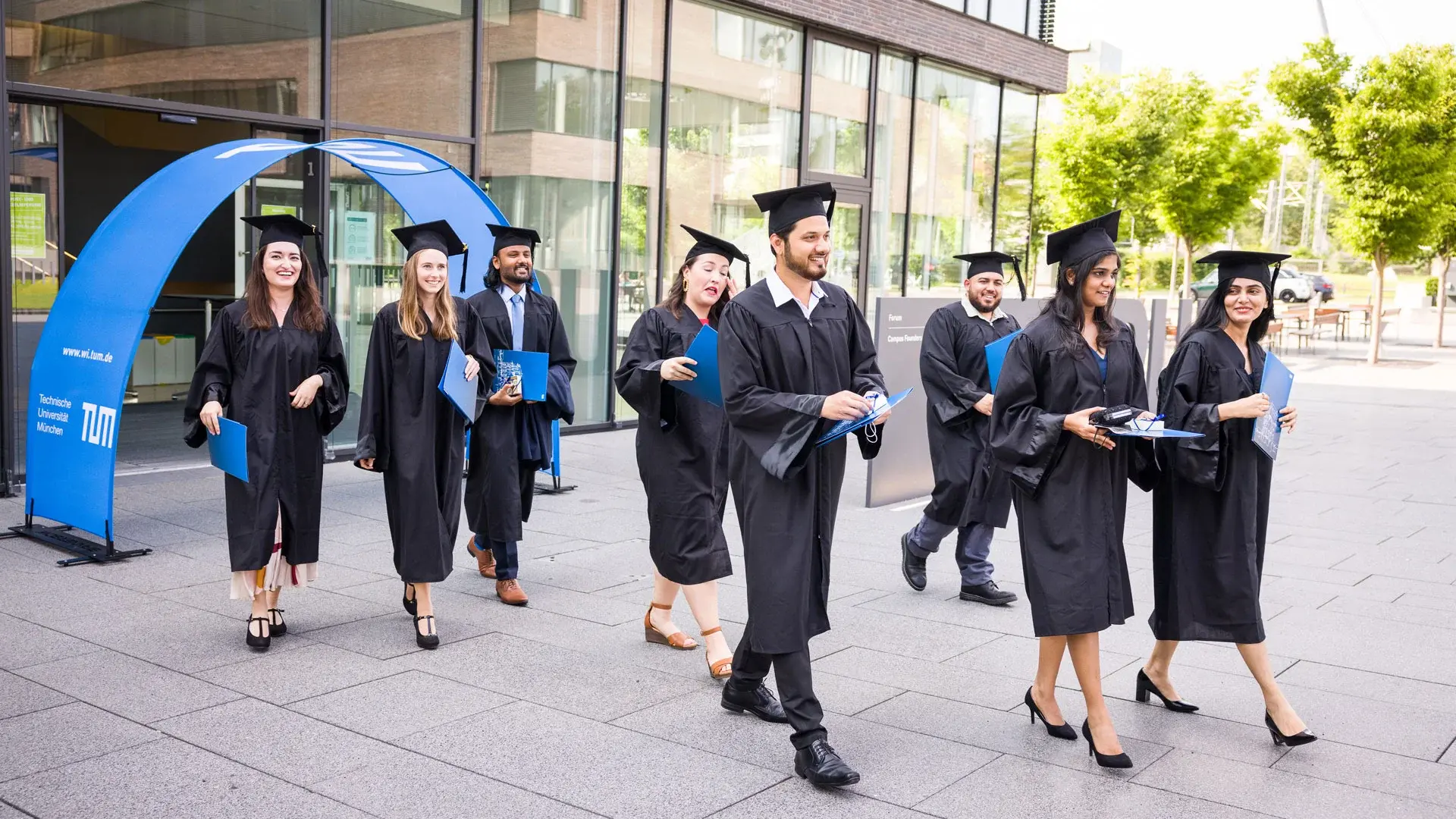 Alumni at graduation ceremony