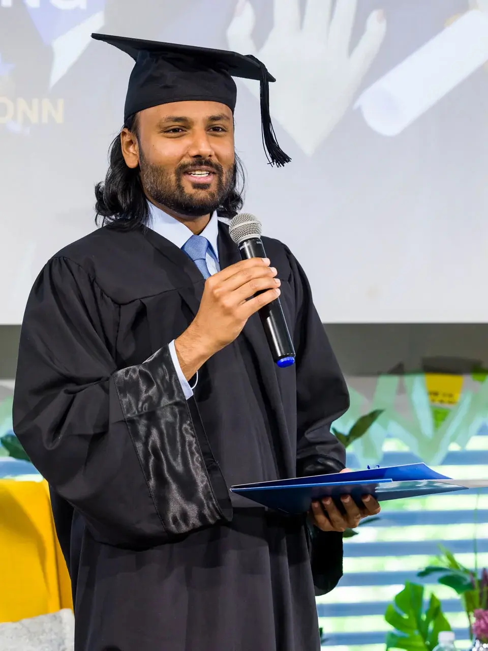 Alumni Vivek Modi with hat